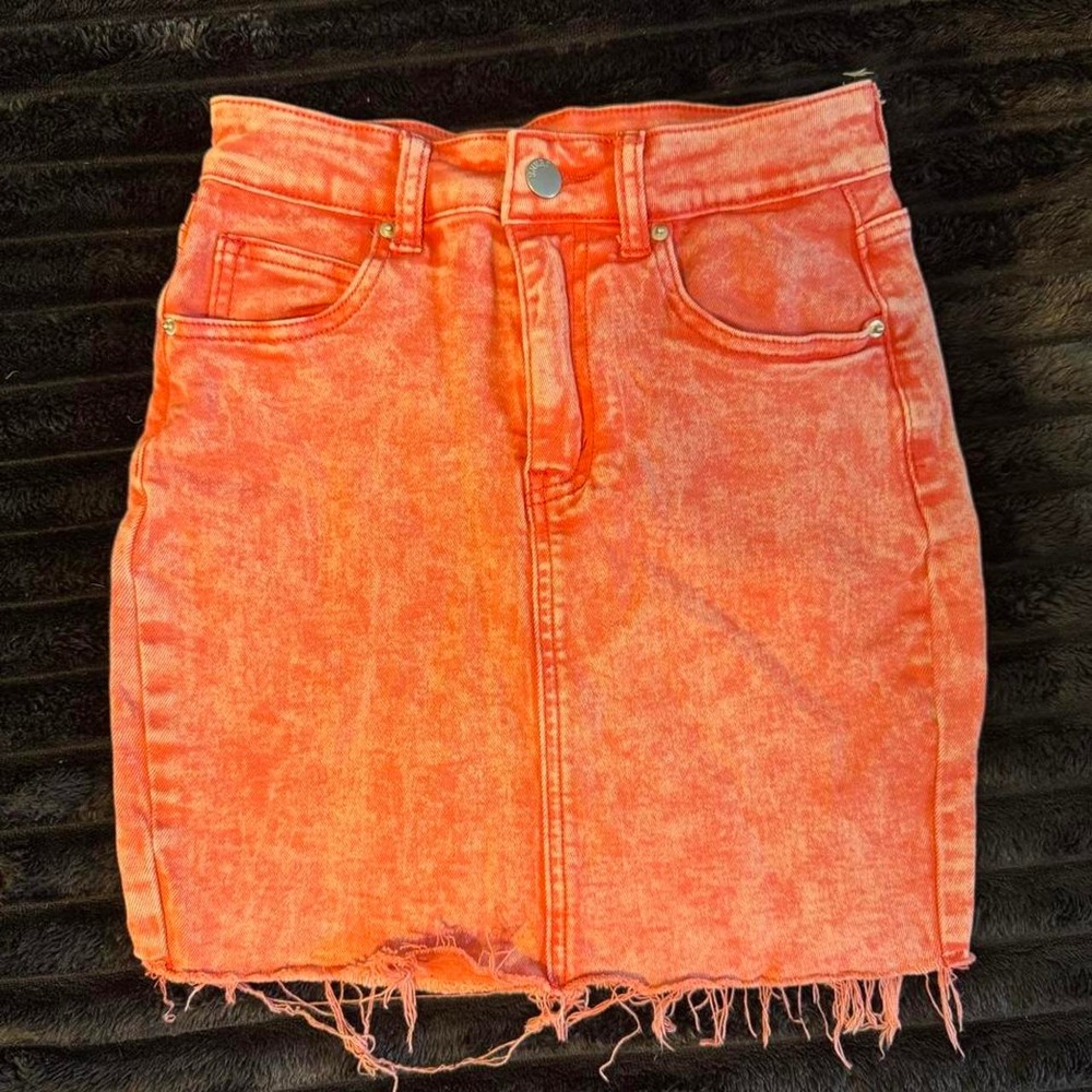 Orange/red denim mini skirt with frayed hem. Size US 2